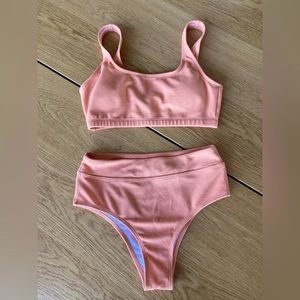Cheeky peach colour bikini.